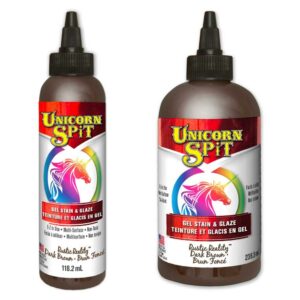 Dark Brown Unicorn SPiT - Rustic Reality, allows anyone to turn ordinary objects into personalised MASTERPIECES! Use on wood, glass, metal, fabric, pottery, wicker, concrete and laminate. Ideal for creating new – or – refinishing thousands of projects. Excellent for crafters, hobbyists, DIYers and pros alike!DARK BROWN PAINT, GEL STAIN and GLAZE in One!Make your project as opaque or vibrant as your dreams requireUse as a paint or dilute with water to create a gel, glaze, stain, white wash or antiquing tintPenetrates deep into bare wood grain or glazes over existing finishes, brightening and highlighting painted surfacesProvides a 3-dimensional effectJasmine scentedDark Brown Unicorn SPiT mixes with the Sparkling SPiT rangeTeal Green Paint, Gel & Stain < Back | Next > Grey Paint, Gel & StainUse Dark Brown Unicorn SPiT as a paint, gel or stain on most any material. Create masterpieces on wood, glass, metal, fabric, pottery, concrete, laminate, wicker and most other substrates.GENERAL DIRECTIONS:SHAKE WELL and test small area before use. Can be applied with a brush, foam pad, or your hands! Dry time depends upon thickness of the application. Dry time is approximately 30-60 minutes (depending on material, humidity and temperature) or until a chalky finish appears. Unicorn SPiT dries quickly. Use a spray bottle of water to keep product from drying out and to easily manipulate. Once dry, use a non-waterbased coating to protect, add gloss and dimension.1, Laminate use: Sand the surface with 220 sand paper after cleaning, then dust well before applying.2, Glass: For best results, mix Unicorn SPiT with a WATER-BASED decoupage before applying to glass. For a solid/non-transparent colour, use a 1:1 ratio of Unicorn SPiT /decoupage. For more transparent colour (stained-glass style) results, use 1-part Unicorn SPiT to 4-parts decoupage. Apply mixture directly to glass and let cure completely. To add durability to the exterior of regularly handled items, spray a light, NON-WATER BASED clear coat over project and let dry.Fabric use:Stamping method: Use Unicorn SPiT full strength for “stamping” (creating design on a separate surface and then “stamping” it on to a fabric project).  Then, use a water bottle and your hand or brush to blend.Direct to fabric projects:  Mix Unicorn SPiT with 3-7 parts water in a spray bottle or cup and brush it on, drip it on or spray it on.   Protecting your finished project:  Use a NON-WATERBASED product intended for waterproofing fabric after Unicorn SPiT has completely dried. Washing: Fabric will retain much of the Unicorn SPiT colour if treated before washing (see various methods below)*.  For best results, wash in cold water by hand (with very little laundry detergent).  Rinse with cold water.  Various methods to increase the colourfastness of the Unicorn SPiT before washing are as follows:        - Fabric Medium:  Mix a Fabric Medium with Unicorn SPiT according to instructions on the Fabric Medium bottle.        - Allure® Dimensional Design Adhesive Paint:  Mix Unicorn SPiT with Allure Gloss (Shiny Clear) in a 1:1 ratio.  Dry flat 5 hours.  Washable after 72 hours.         - Non-waterbased fabric protectant:  Let Unicorn SPiT dry.  Apply protectant.  Allow to dry as indicated on product. Let set for 24 hours before washing.        - Hair Dryer:  Let Unicorn SPiT dry.  Use hottest blow dryer setting to heat fabric until fabric is hot.  Allow to cool back down to room temperature.  Let set for 24 hours before washing.        - Iron:  Let Unicorn SPiT dry.  Put iron on hottest setting (without moisture).  Lay wax paper over fabric.  Iron front and back of fabric until hot.  Allow to cool back down to room temperature.  Let set for 24 hours before washing.        - Vinegar:  Put fabric with dried Unicorn SPiT design in cold water/vinegar at a 1:1 ratio mix.  Let set in vinegar for 24 hours.  Rinse with cold water and a very small amount of laundry detergent immediately after removing from water/vinegar solution.  Lay flat to dry.        - Clothes dryer:  Put fabric with dried Unicorn SPiT design in dryer for 1 hour on hottest setting.  Remove and allow to cool to room temperature.  Let set for 24 hours before washing.    *Zia is not a colourfast colour.  Use other colours if project will be exposed to moisture.    NOTE:  If a more washed-out look is desired:  Let set for 24 hours before washing.  Machine wash in gentle cycle with cold water.  Machine dry if desired.If you have any further questions then visit our Unicorn SPiT FAQ SectionSafety Data Sheet can be download here.