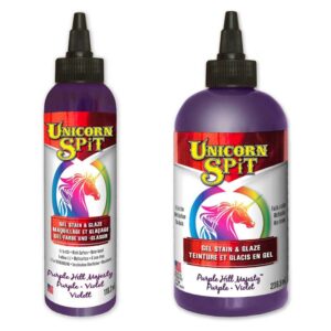 Purple Unicorn SPiT - Purple Hill Majesty, allows anyone to turn ordinary objects into personalised MASTERPIECES! Use on wood, glass, metal, fabric, pottery, wicker, concrete and laminate. Ideal for creating new – or – refinishing thousands of projects. Excellent for crafters, hobbyists, DIYers and pros alike!PURPLE PAINT, GEL STAIN and GLAZE in One!Make your project as opaque or vibrant as your dreams requireUse as a paint or dilute with water to create a gel, glaze, stain, white wash or antiquing tintPenetrates deep into bare wood grain or glazes over existing finishes, brightening and highlighting painted surfacesProvides a 3-dimensional effectJasmine scentedPurple Unicorn SPiT mixes with the Sparkling SPiT rangeBlue Paint, Gel & Stain < Back | Next > Black Paint, Gel & StainUse Purple Unicorn SPiT as a paint, gel or stain on most any material. Create masterpieces on wood, glass, metal, fabric, pottery, concrete, laminate, wicker and most other substrates.GENERAL DIRECTIONS:SHAKE WELL and test small area before use. Can be applied with a brush, foam pad, or your hands! Dry time depends upon thickness of the application. Dry time is approximately 30-60 minutes (depending on material, humidity and temperature) or until a chalky finish appears. Unicorn SPiT dries quickly. Use a spray bottle of water to keep product from drying out and to easily manipulate. Once dry, use a non-waterbased coating to protect, add gloss and dimension.1, Laminate use: Sand the surface with 220 sand paper after cleaning, then dust well before applying.2, Glass: For best results, mix Unicorn SPiT with a WATER-BASED decoupage before applying to glass. For a solid/non-transparent colour, use a 1:1 ratio of Unicorn SPiT /decoupage. For more transparent colour (stained-glass style) results, use 1-part Unicorn SPiT to 4-parts decoupage. Apply mixture directly to glass and let cure completely. To add durability to the exterior of regularly handled items, spray a light, NON-WATER BASED clear coat over project and let dry.Fabric use:Stamping method: Use Unicorn SPiT full strength for “stamping” (creating design on a separate surface and then “stamping” it on to a fabric project).  Then, use a water bottle and your hand or brush to blend.Direct to fabric projects:  Mix Unicorn SPiT with 3-7 parts water in a spray bottle or cup and brush it on, drip it on or spray it on.   Protecting your finished project:  Use a NON-WATERBASED product intended for waterproofing fabric after Unicorn SPiT has completely dried. Washing: Fabric will retain much of the Unicorn SPiT colour if treated before washing (see various methods below)*.  For best results, wash in cold water by hand (with very little laundry detergent).  Rinse with cold water.  Various methods to increase the colourfastness of the Unicorn SPiT before washing are as follows:        - Fabric Medium:  Mix a Fabric Medium with Unicorn SPiT according to instructions on the Fabric Medium bottle.        - Allure® Dimensional Design Adhesive Paint:  Mix Unicorn SPiT with Allure Gloss (Shiny Clear) in a 1:1 ratio.  Dry flat 5 hours.  Washable after 72 hours.         - Non-waterbased fabric protectant:  Let Unicorn SPiT dry.  Apply protectant.  Allow to dry as indicated on product. Let set for 24 hours before washing.        - Hair Dryer:  Let Unicorn SPiT dry.  Use hottest blow dryer setting to heat fabric until fabric is hot.  Allow to cool back down to room temperature.  Let set for 24 hours before washing.        - Iron:  Let Unicorn SPiT dry.  Put iron on hottest setting (without moisture).  Lay wax paper over fabric.  Iron front and back of fabric until hot.  Allow to cool back down to room temperature.  Let set for 24 hours before washing.        - Vinegar:  Put fabric with dried Unicorn SPiT design in cold water/vinegar at a 1:1 ratio mix.  Let set in vinegar for 24 hours.  Rinse with cold water and a very small amount of laundry detergent immediately after removing from water/vinegar solution.  Lay flat to dry.        - Clothes dryer:  Put fabric with dried Unicorn SPiT design in dryer for 1 hour on hottest setting.  Remove and allow to cool to room temperature.  Let set for 24 hours before washing.    *Zia is not a colourfast colour.  Use other colours if project will be exposed to moisture.    NOTE:  If a more washed-out look is desired:  Let set for 24 hours before washing.  Machine wash in gentle cycle with cold water.  Machine dry if desired.If you have any further questions then visit our Unicorn SPiT FAQ SectionSafety Data Sheet can be download here.