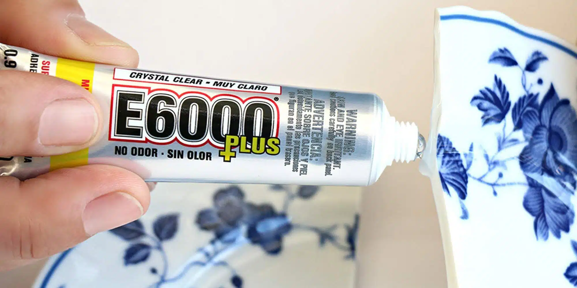 E6000 Plus adhesive is being used to repair a ceramic plate